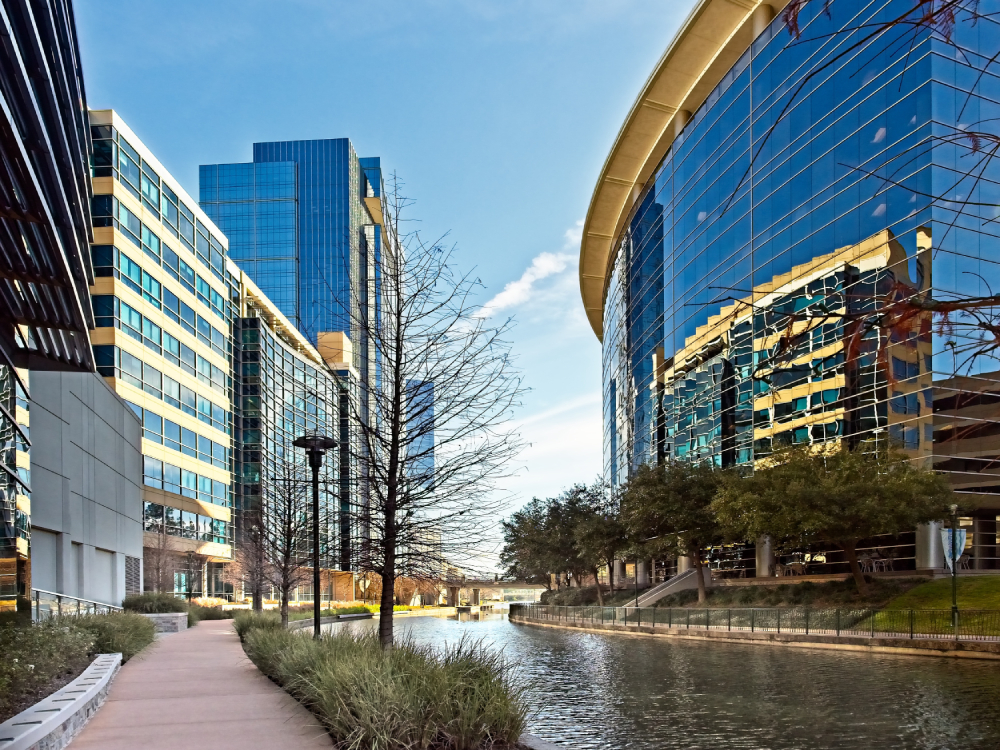 Waterway with Glass Buildings in The Woodlands TX Waterway with Glass Buildings in The Woodlands TX